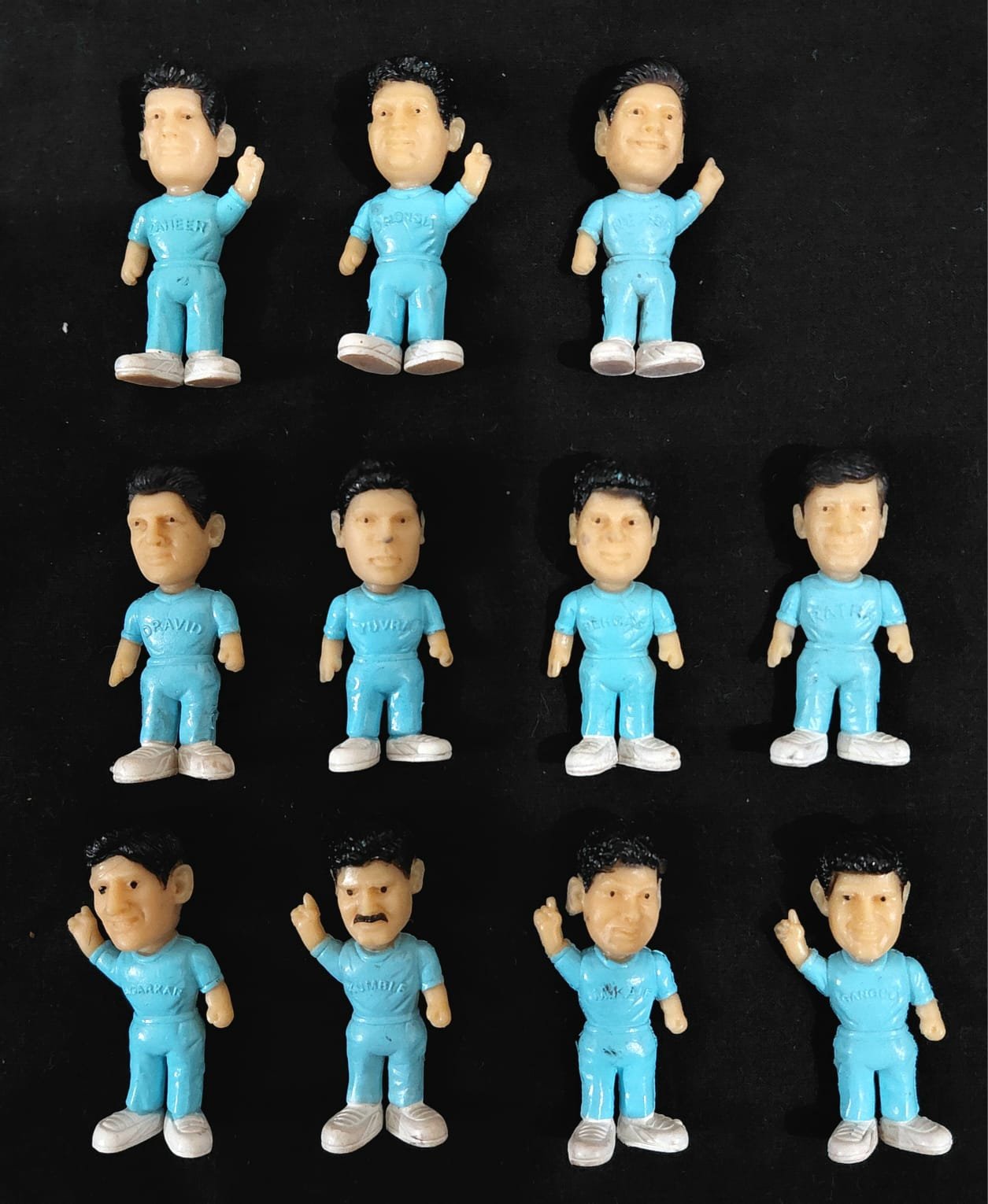 COLGATE INDIAN CRICKET TEAM MINIATURE FIGURES, POPULAR COLLECTIBLES that were offered as a freebie with COLGATE TOOTHPASTE BOXES in the early 2000s, SPECIFICALLY around the time of the 2003 CRICKET WORLD CUP.   THEY are 4.5 cm in length and are now CONSID